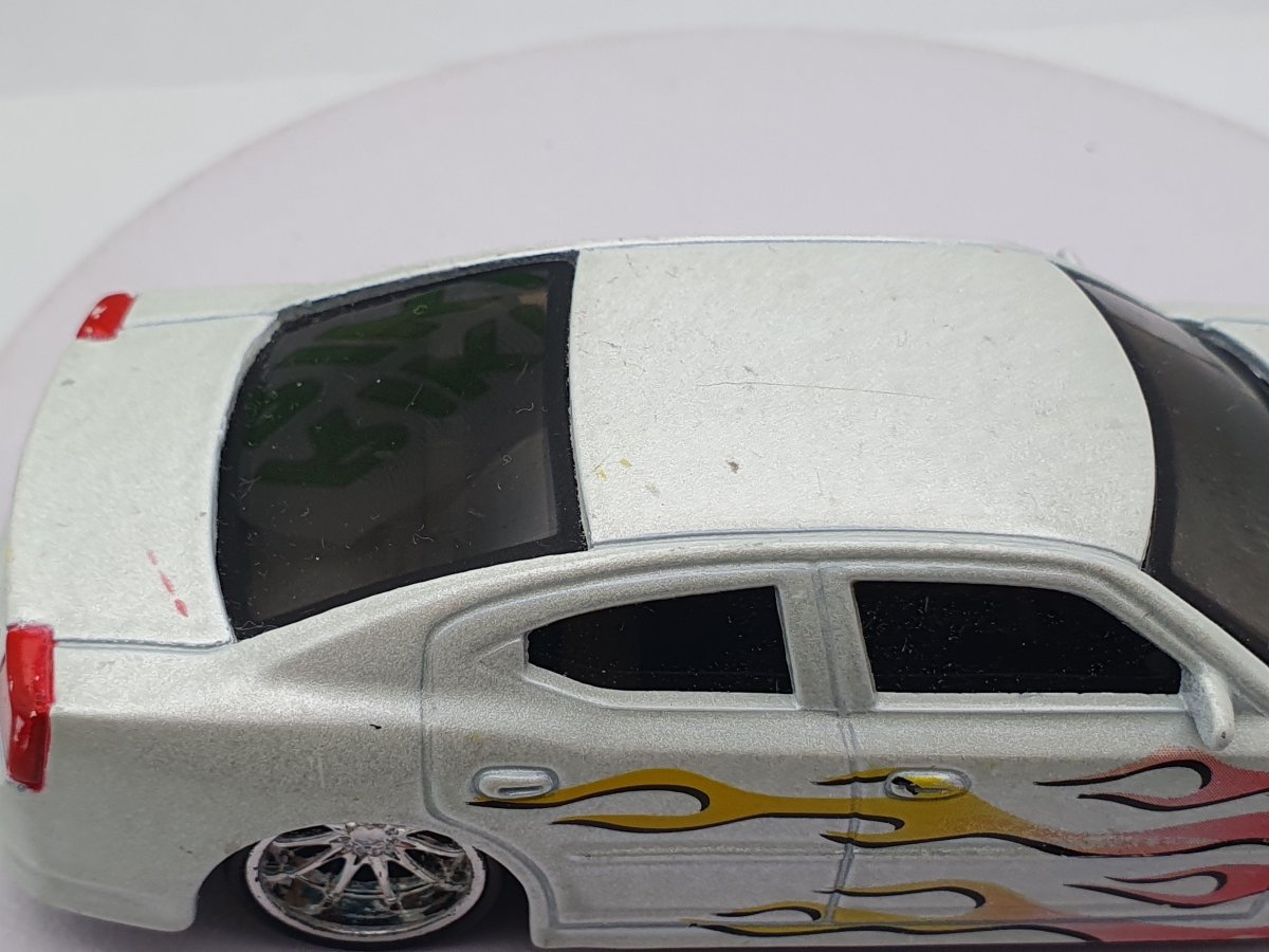Dodge Charger RT Burago 1/43 Bianco 2006 - RikiToys - Burago