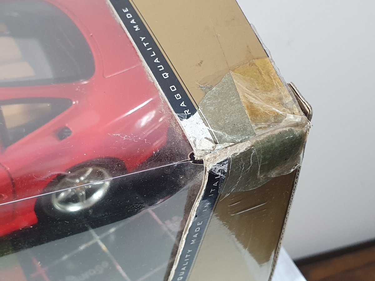 Ferrari 550 Maranello Burago 1/18 Rosso 1996 - RikiToys - Burago