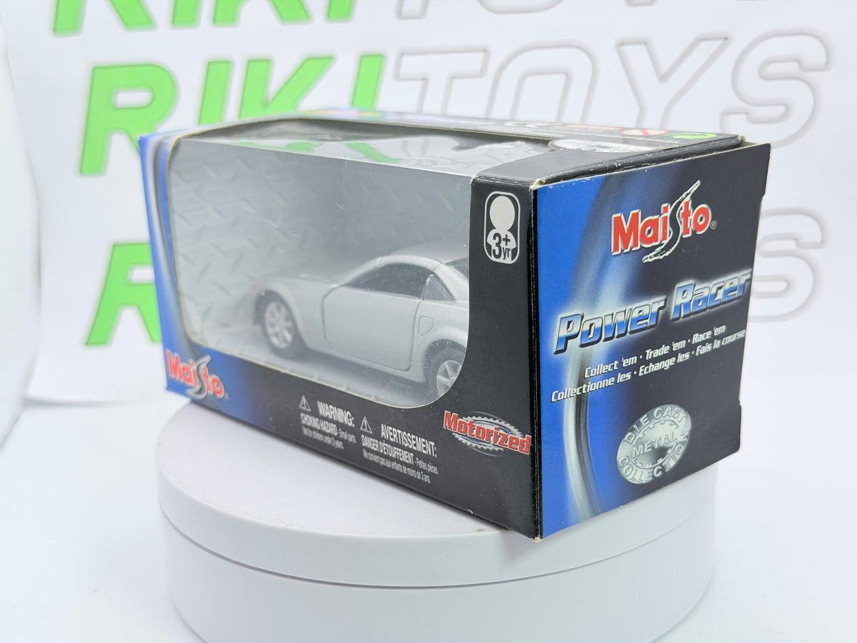 Cadillac Evoq Coupé Maisto 1/40 Argento