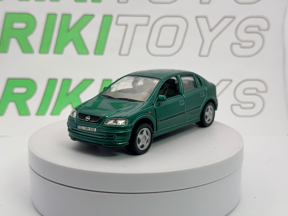 Opel Astra 4 porte Welly 1/38 Verde
