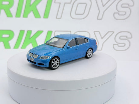 BMW 330i Welly 1/43 Blu - RikiToys - Welly