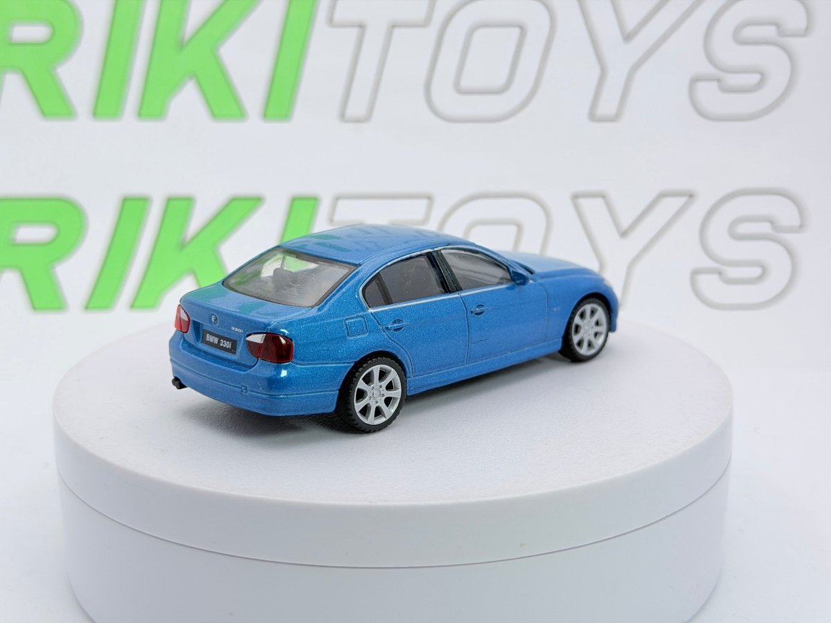 BMW 330i Welly 1/43 Blu - RikiToys - Welly