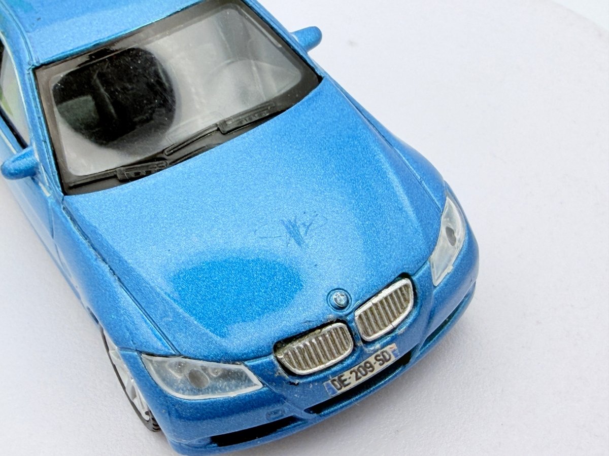 BMW 330i Welly 1/43 Blu - RikiToys - Welly