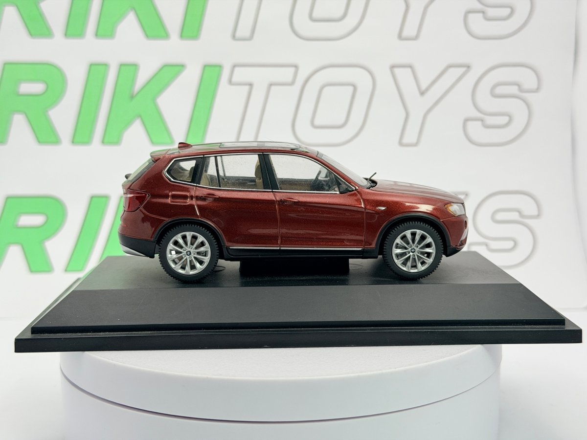 BMW X3 Schuco 1/43 Rosso metallizzato 2010 - RikiToys - Schuco