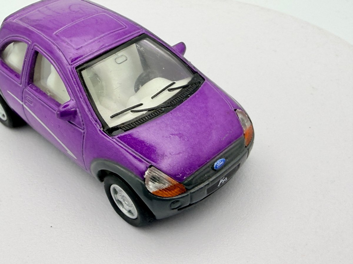 Ford Ka 1a Serie Kinsmart 1/64 Viola 1996 - RikiToys - Kinsmart