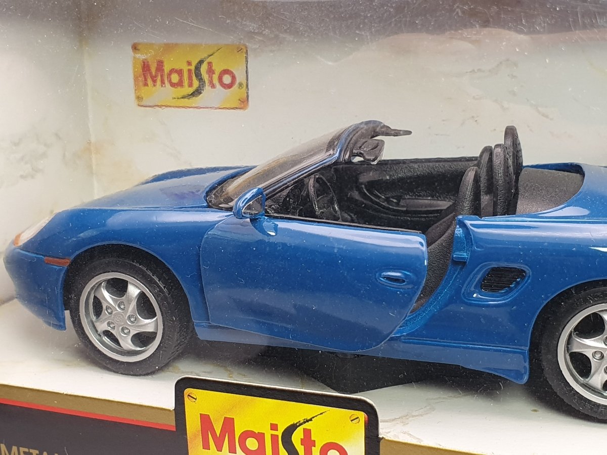 Porsche Cayman Maisto 1/24 Blu - RikiToys - Maisto#